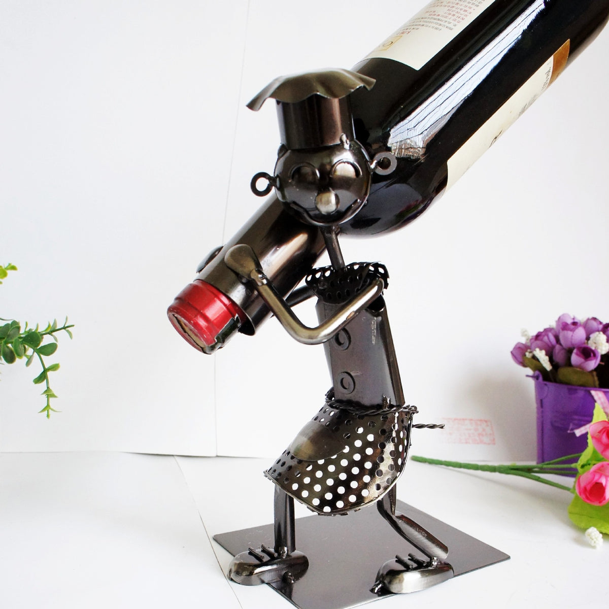 "Little Ghost Wine Rack - Collectible Iron Decor"